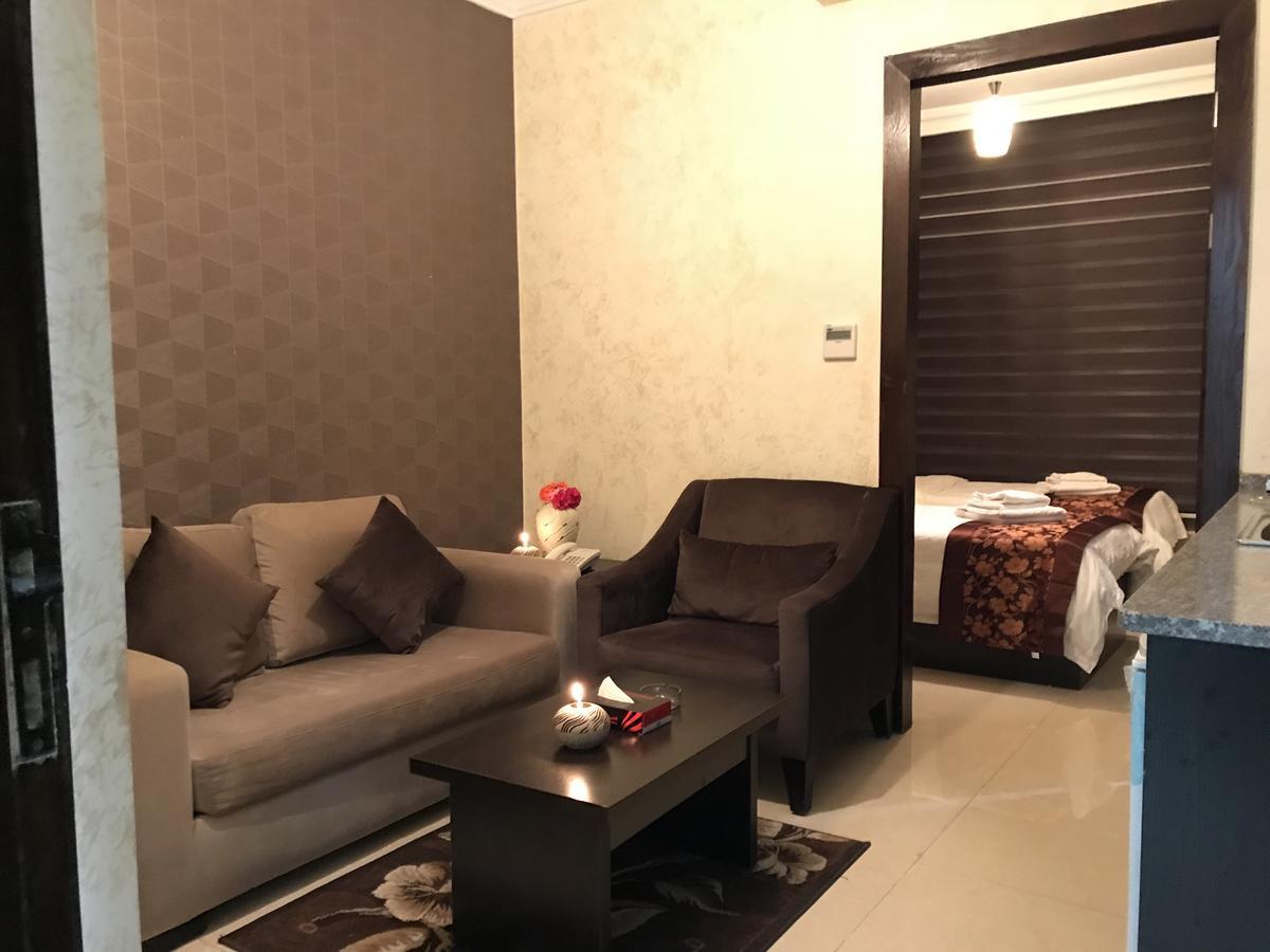 Al Haneen Hotel Apartments Safut Luaran gambar